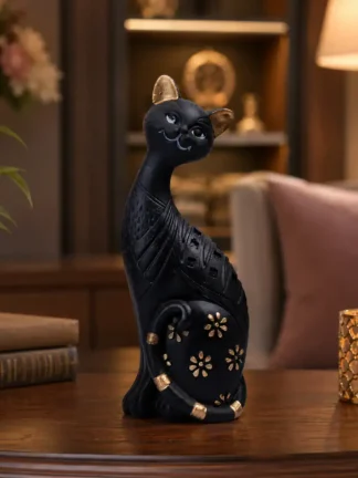 Black Cat Decorative Showpiece Statue made of polyresin displayed on a luxury wooden table in a modern living room, elegant home décor accent for shelves, offices, and gifting.