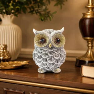 Luxury owl showpiece resin statue for home décor with golden eyes and vintage design