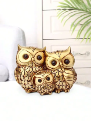 Golden owl statue family set of three decorative figurines for home decor and Vastu prosperity.
