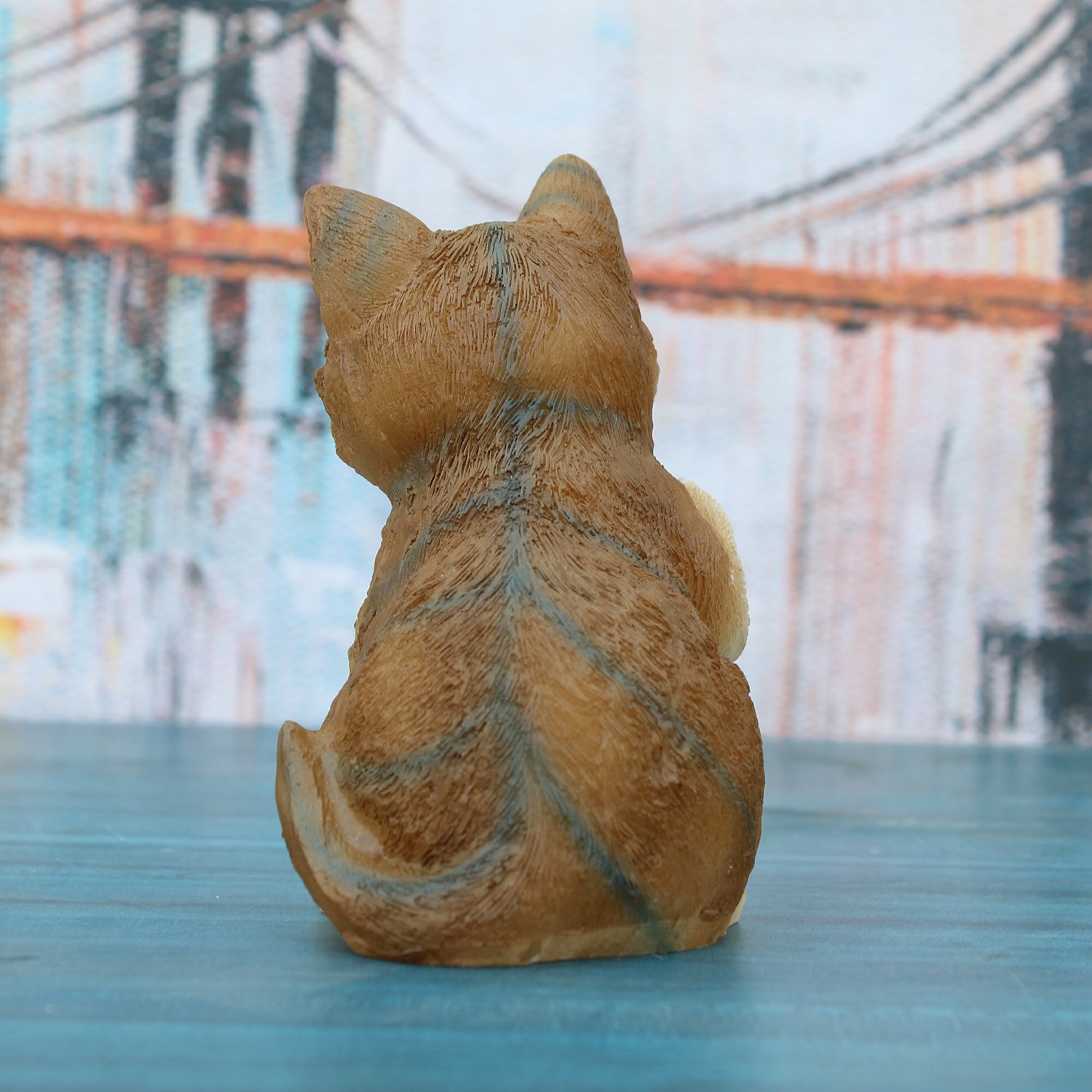 Little Brown Cat Idol Figurine, Little Yellow Cat Idol Figurine, Little Yellow Cat Idol Figurine, Little Yellow Cat Idol Figurine.