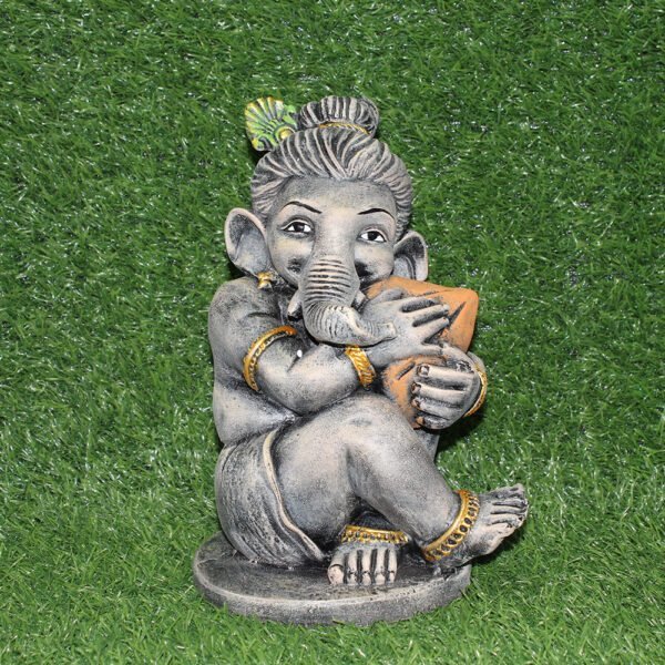 Small grey polyresin Ganesh idol holding modak, decorative Ganpati statue for home and office desk decor