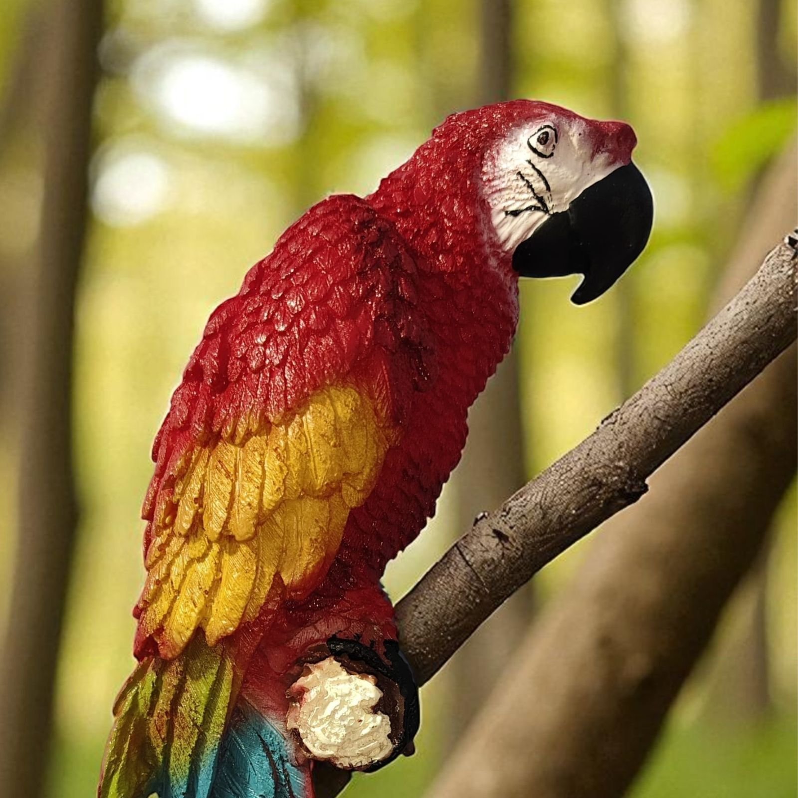 Close-up shot showing feather texture and UV-resistant paint quality of the resin bird statue