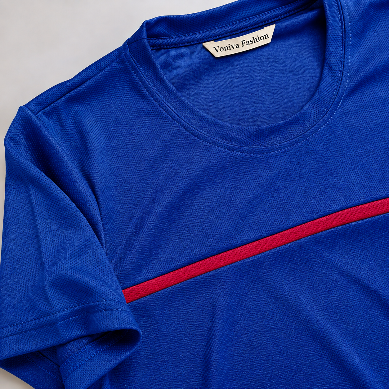 Close-up view of a Men's Royal Blue Micro-Mesh activewear t-shirt.