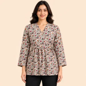 Women's floral print wrap style hip length kurti in beige featuring a V-neckline, full sleeves, adjustable waist tie, and multicolor floral pattern. Styled with black pants, this lightweight casual kurti from Voniva Fashion is ideal for everyday wear, office wear, and festive casual occasions. High-quality studio product image with clear fabric texture and stitching details.