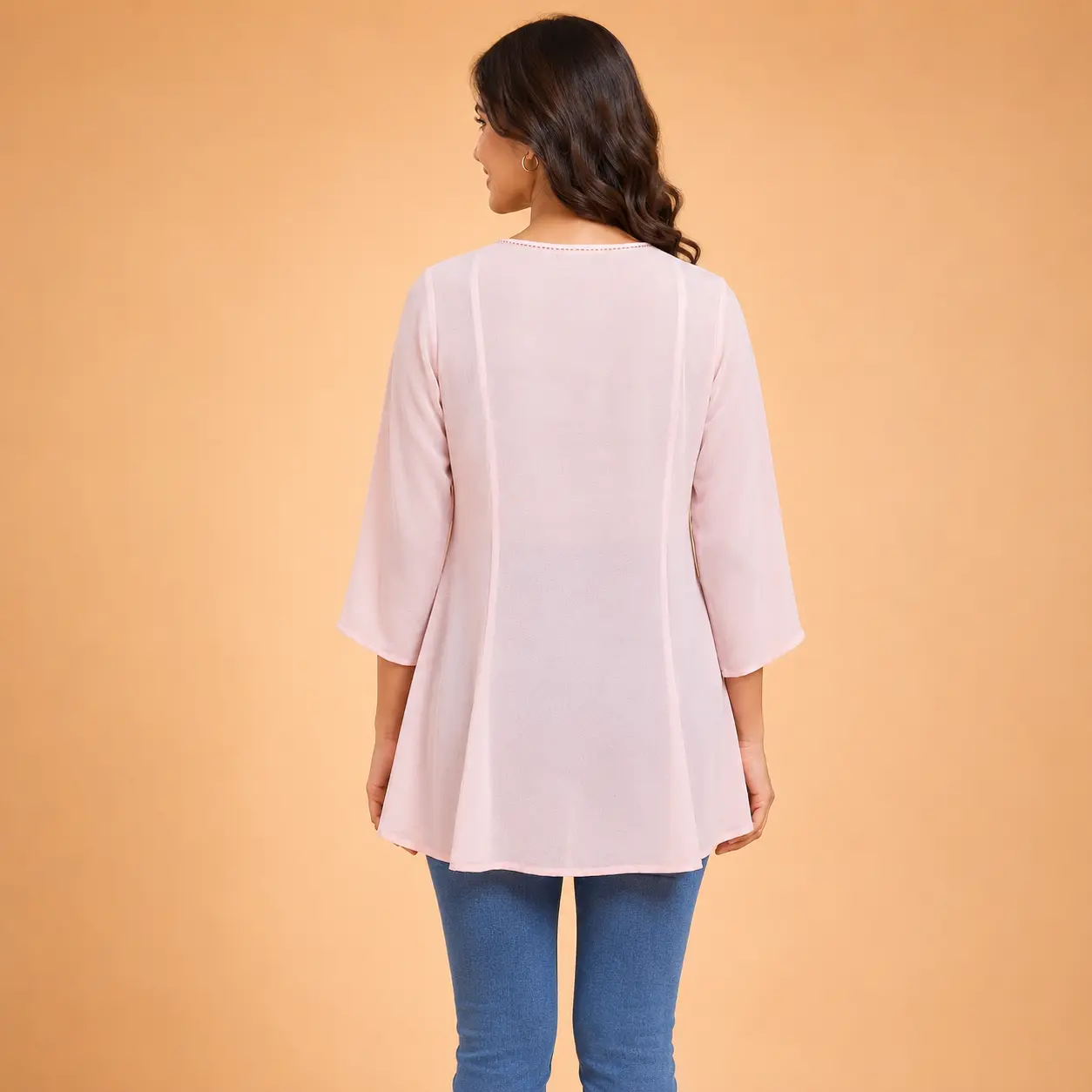 Back view of light pink georgette short kurti top for women