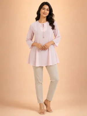 Women wearing light pink georgette A-line tunic top with keyhole neck