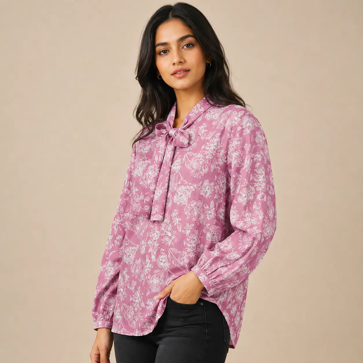 Side view of stylish pink floral print blouse with full balloon sleeves for women