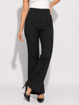 Front view of model wearing lavender high waist straight flared trousers with white top
