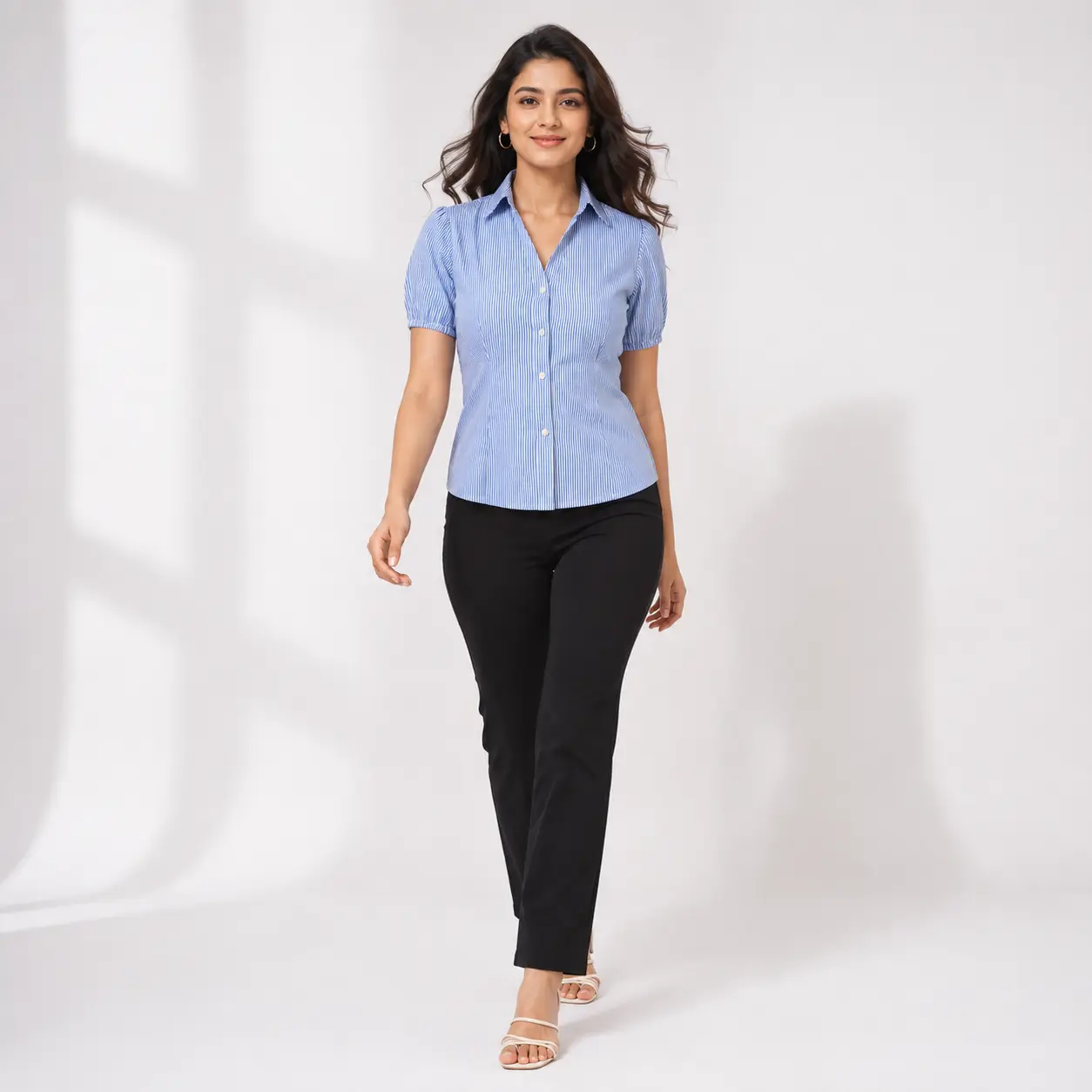 Women’s blue and white striped button-up top model view