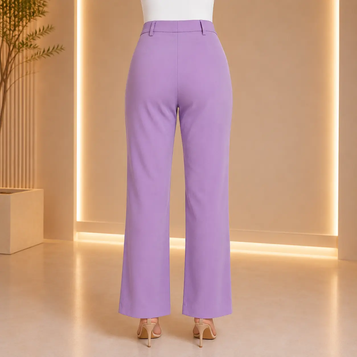 Model wearing black high waist flared formal trousers side profile with heels