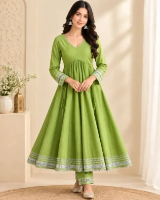 Green cotton cambric Anarkali kurta pant set with silver gota patti lace, front view